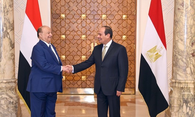 FILE - President Abdel Fatah al-Sisi and Yemeni President Abdrabbuh Mansour Hadi Aug. 13, 2018