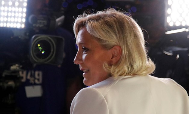 French far-right National Rally (Rassemblement National) party leader Marine Le Pen talks to the media after the first results in Paris, France, May 26, 2019. REUTERS/Charles Platiau
