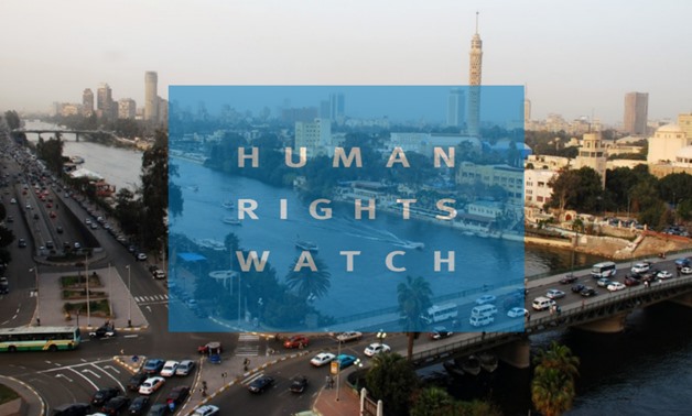 Compiled photo: Cars crisscross through the inner city of Cairo Egypt – Courtesy of the US Air Force photo/Senior Airman Sara Csurilla and the logo of Human Rights Watch 