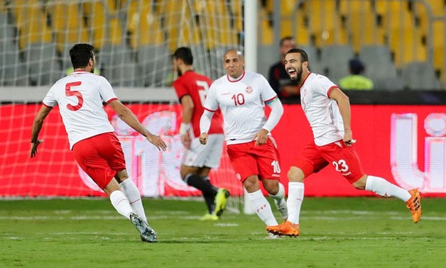 Tunisia's Naim Sliti celebrates scoring their first goal with team mates REUTERS/Amr Abdallah Dalsh

