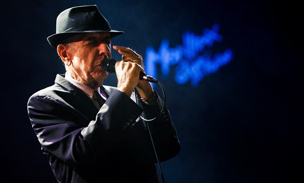 FILE PHOTO: Canadian singer-songwriter Leonard Cohen performs during the first night of the 47th Montreux Jazz Festival in Montreux, Switzerland on July 4, 2013. REUTERS/Valentin Flauraud/File Photo
