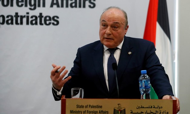 FILE PHOTO - Palestinian Finance Minister Shukri Bishara gestures during a news conference in Ramallah, in the Israeli-occupied West Bank February 21, 2019. REUTERS/Mohamad Torokman