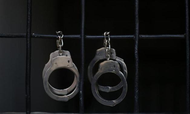 Handcuffs - Suhaib Salem/Reuters
