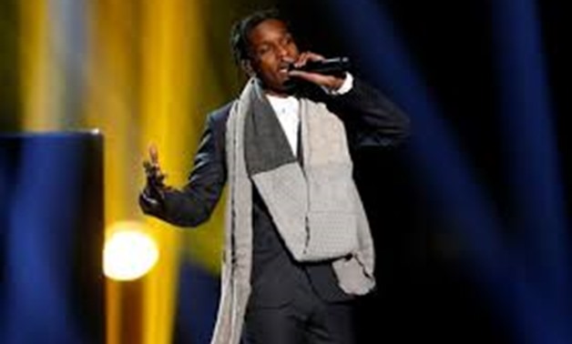 FILE PHOTO: A$AP Rocky performs "I'm Not the Only One" with Sam Smith (not pictured) during the 42nd American Music Awards in Los Angeles, California November 23, 2014. REUTERS/Mario Anzuoni/File Photo
