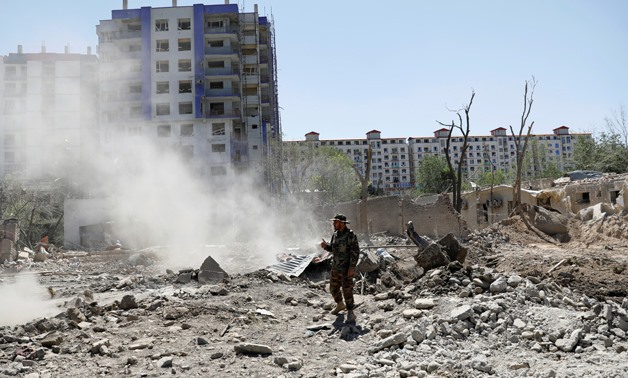 An Afghan National Army (ANA) soldier stands at the site of Monday's blast in Kabul, Afghanistan July 2, 2019. REUTERS/Mohammad Ismail