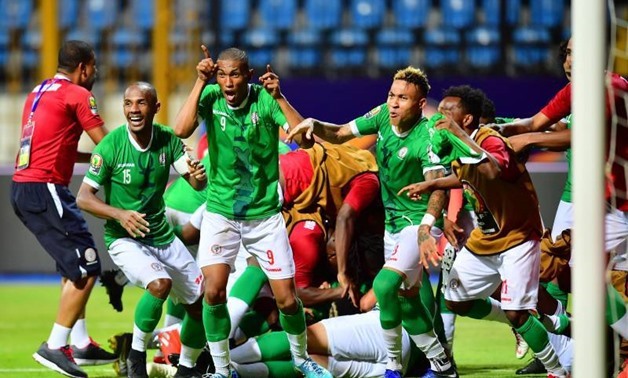File- Madagascar players celebrate the victory, Photo courtesy of Bleacher Report