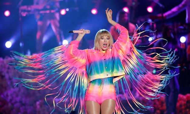 FILE PHOTO: FILE PHOTO: Taylor Swift performs at the iHeartRadio Wango Tango concert in Carson, California, U.S., June 1, 2019. REUTERS/Mario Anzuoni/File Photo/File Photo.