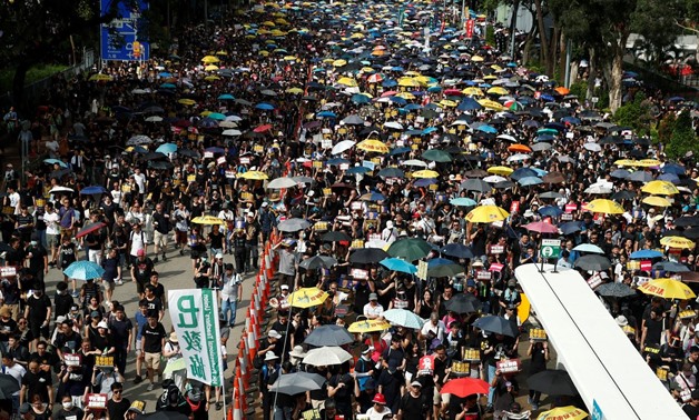 Anti-extradition demonstrators march to call for democratic reforms, in Hong Kong, China July 21, 2019. REUTERS/Edgar Su
