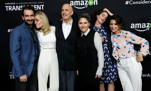 FILE PHOTO - Creator of the show Jill Soloway (3rd R) poses with cast members (L-R) Jay Duplass, Judith Light, Jeffrey Tambor, Gaby Hoffmann and Amy Landecker at a premiere screening for the television series "Transparent" at Directors Guild of America in