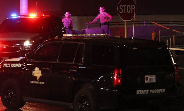 EL PASO, TEXAS - AUGUST 03: Police keep watch outside Walmart near the scene of a mass shooting which left at least 20 people dead on August 3, 2019 in El Paso, Texas. A 21-year-old male suspect was taken into custody in the city which sits along the U.S.