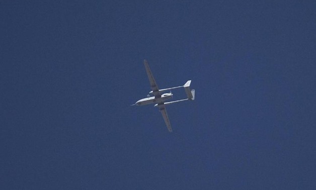 An Israeli drone flies over the West Bank city of Hebron in this June 14, 2014 file photo. — Reuters pic
