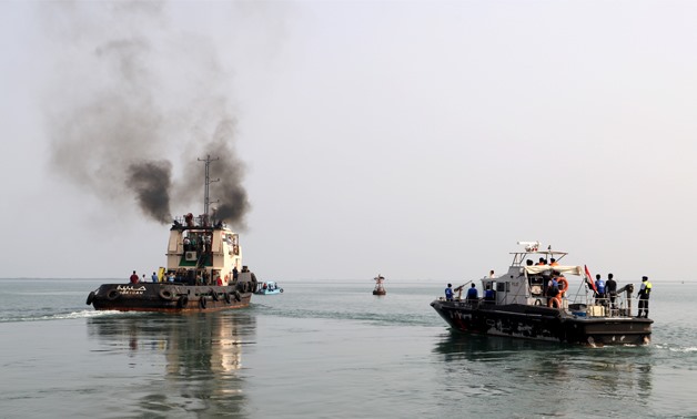 A tug boat (L) ferries members of a Houthi delegation to attend a meeting of a committee overseeing a U.N.-led peace deal that will be held on board a U.N.-chartered ship off YemenÕs port city of Hodeidah September 8, 2019. REUTERS/Abduljabbar Zeyad.