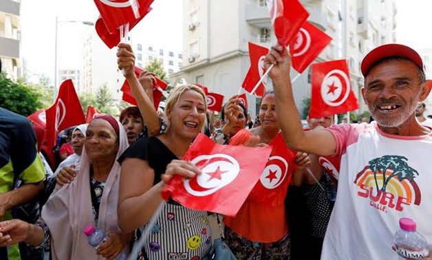 FILE PHOTO: Supporters react after Tunisian Prime Minister Youssef Chahed submitted his candidacy for the presidential elections, in Tunis, Tunisia August 9, 2019. REUTERS/Zoubeir Souissi/File Photo
