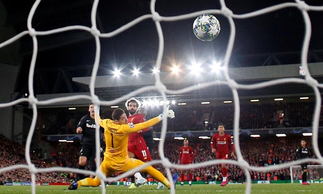 Soccer Football - Champions League - Group E - Liverpool v FC Salzburg - Anfield, Liverpool, Britain - October 2, 2019 Liverpool's Mohamed Salah scores their fourth goal REUTERS/Andrew Yates 