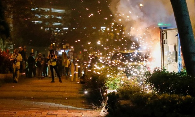 An electricity switch box explodes as it was set on fire by protesters, after Chow Tsz-lok, 22, a university student, died after he fell during a protest, at Tseung Kwan O, Hong Kong, China November 8, 2019. REUTERS/Tyrone Siu
