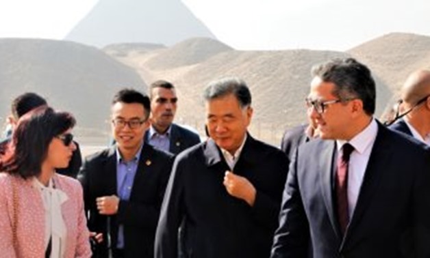 Minister of Antiquities accompanying the Chinese delegation during a tour to the Giza Pyramids - ET