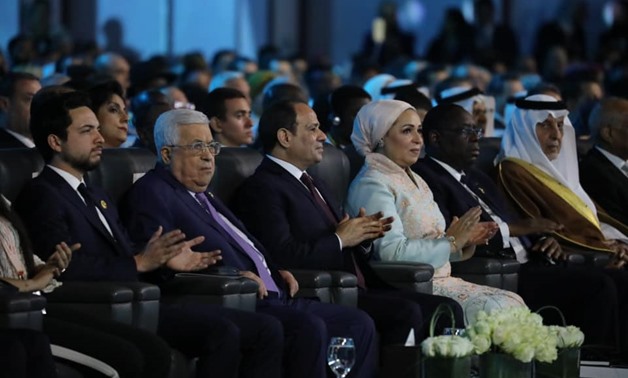 From Left, Palestinian President Mahmoud Abbas, Egyptian President Abdel Fattah el-Sisi, and Egypt's First Lady Entissar el-Sisi during the opening of the World Youth Forum, December 14th, 2019 - Courtesy of the Presidency