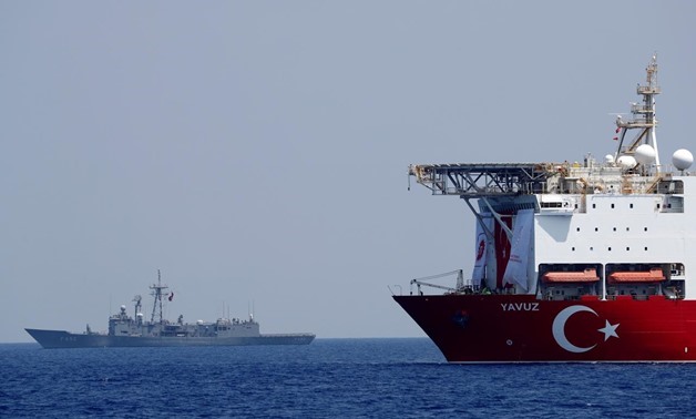 FILE PHOTO: Turkish drilling vessel Yavuz is escorted by Turkish Navy frigate TCG Gemlik (F-492) in the eastern Mediterranean Sea off Cyprus, August 6, 2019. REUTERS/Murad Sezer