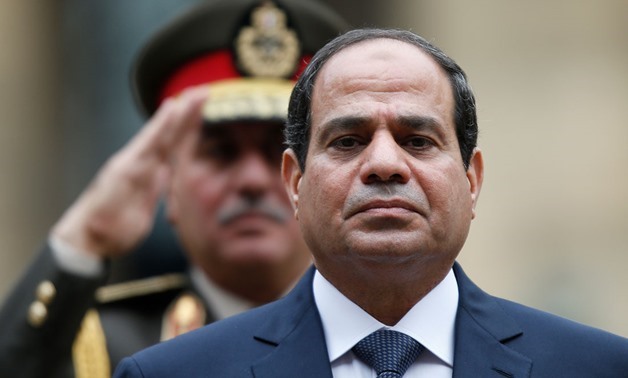 File - President Abdel Fattah al-Sisi attends a military ceremony in the courtyard of the Hotel des Invalides in Paris, France, November 26, 2014. REUTERS