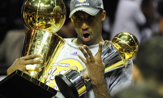 (FILES) In this file photo taken on June 14, 2009 Kobe Bryant of the Los Angeles Lakers celebrates victory following Game 5 of the NBA Finals against the Orlando Magic at Amway Arena in Orlando, Florida. NBA legend Kobe Bryant died Sunday in a helicopter 