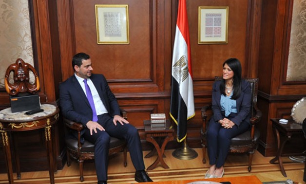 Minister of International Cooperation Rania Al-Mashat with Jordanian Minister of Industry, Trade and Supply Tarek Al-Hamoury - Press Photo

