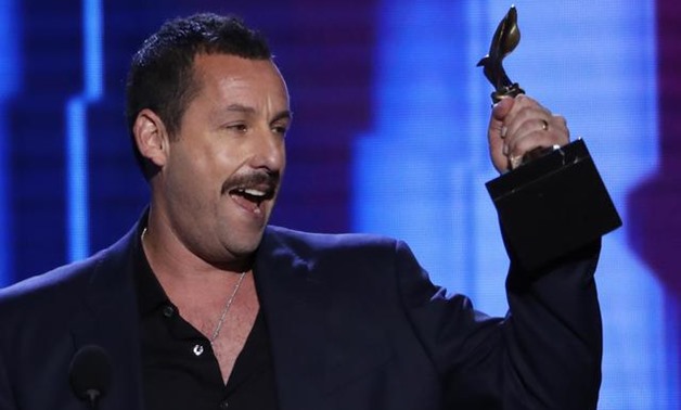 35th Film Independent Spirit Awards - Show - Santa Monica, California, U.S., February 8, 2020 - Adam Sandler accepts the Best Male Lead award for "Uncut Gems." REUTERS/Eric Gaillard.