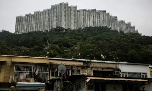 Prices at Wonderland Villas have risen, waned and risen again, as Hong Kong property has swung through boom and bust - AFP/Elaine YU 