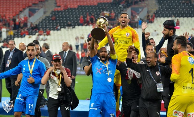 Zamalek captain Shikabala holds the Egyptian Super Cup award 