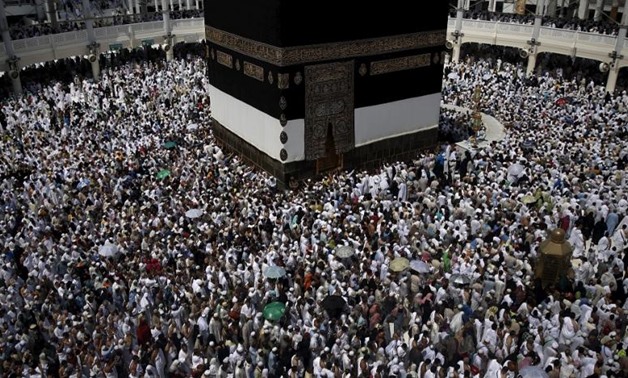 FILE - Muslim pilgrims pray around the holy Kaaba at the Grand Mosque, 2015 - Reuters