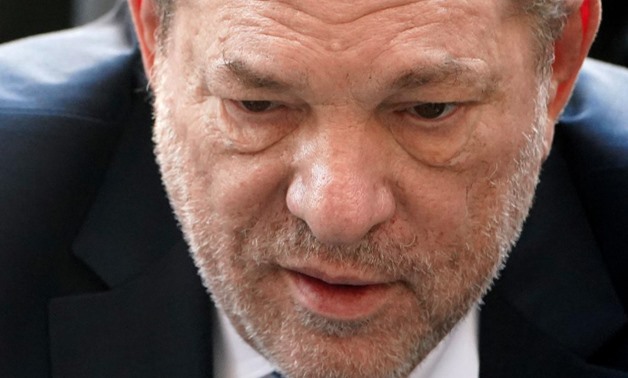 FILE PHOTO: Film producer Harvey Weinstein arrives at the New York Criminal Court during his ongoing sexual assault trial in the Manhattan borough of New York City, New York, U.S., February 24, 2020. REUTERS/Carlo Allegri