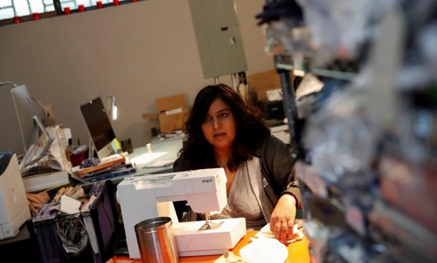 Smita Paul, founder of Indigo Handloom, sews face masks, after California Governor Gavin Newsom's implemented statewide "stay at home order" directing the state's 40 million residents to stay in their homes in the face of the fast-spreading coronavirus di