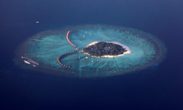 FILE PHOTO: An areal view shows a resort island in the Maldives December 14, 2009. REUTERS/Reinhard Krause/File Photo