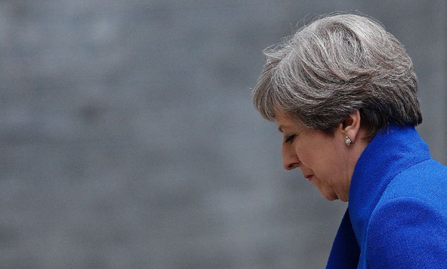 British Prime Minister Theresa May has defied calls to step down after her Conservative party lost its parliamentary majority - AFP
