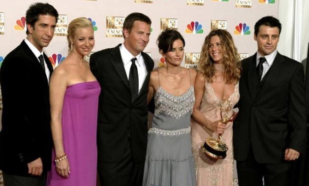 FILE PHOTO: The cast of "Friends" appears in the photo room at the 54th annual Emmy Awards in Los Angeles September 22, 2002. From the left are, David Schwimmer, Lisa Kudrow, Matthew Perry, Courteney Cox Arquette, Jennifer Aniston and Matt LeBlanc. REUTER