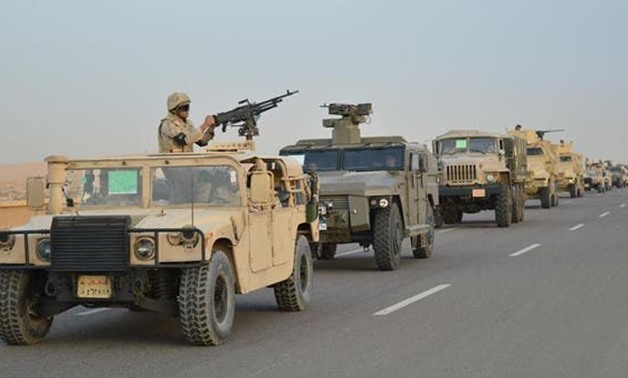FILE- Egyptian Army’s armored vehicles on a highway to North Sinai - Reuters