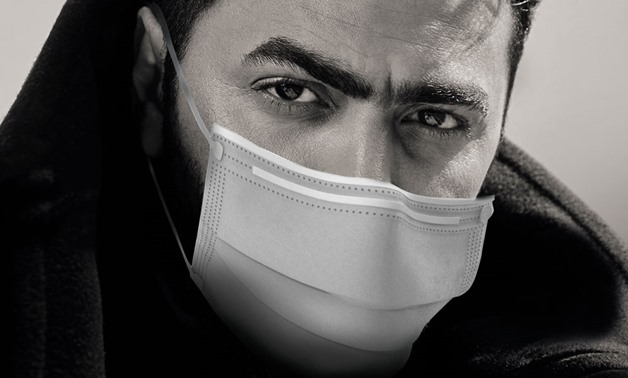 Tamer Hosni wearing a face-mask - ET