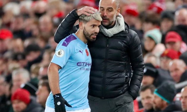 Premier League - Liverpool v Manchester City - Anfield, Liverpool, Britain - November 10, 2019 Manchester City's Sergio Aguero with manager Pep Guardiola after being substituted off Action Images via Reuters/Carl Recine

