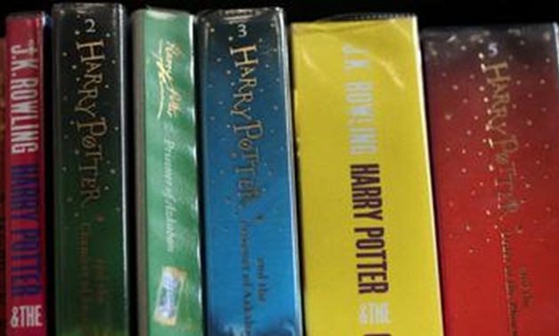 FILE PHOTO: Books from the Harry Potter series by author J.K. Rowling are seen on a shelf inside Widnes Library in Widnes, Britain September 12, 2018. REUTERS/Phil Noble/File Photo.