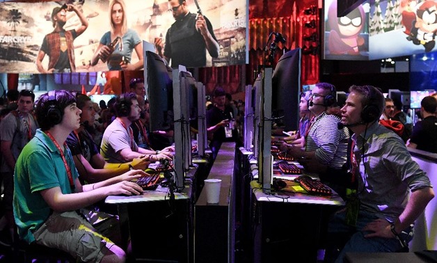Gamers play the Ubisoft 'Rainbow Siege' game at the Los Angeles Convention center on day one of E3 2017, the three day Electronic Entertainment Expo, one of the biggest events in the gaming industry calendar, in Los Angeles, on June 13, 2017 - AFP 