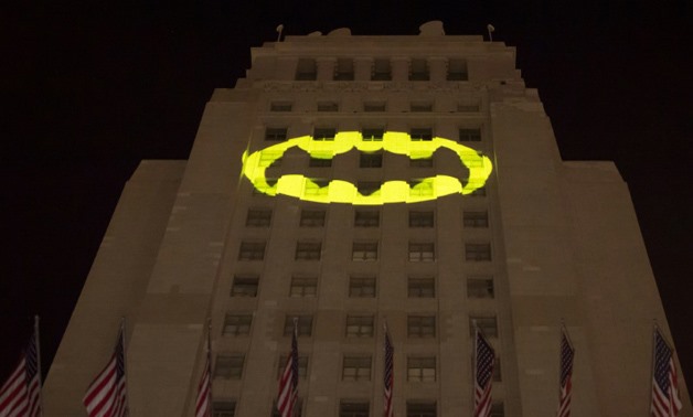 The "Bat-signal" is projected onto Los Angeles City Hall in a tribute to the late actor Adam West who played the caped crusader in the 1960s TV series - AFP/Robyn Beck