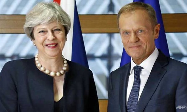 British Prime Minister Theresa May (left) and European Council President Donald Tusk pose during a EU leaders summit in Brussels. (FRANCOIS LENOIR/AFP)
