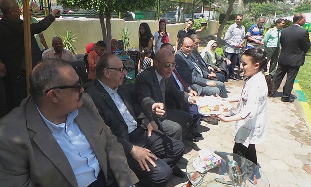 Cairo Governer Eats Feast's Cookies in the opening of (The Family Park) - file photo