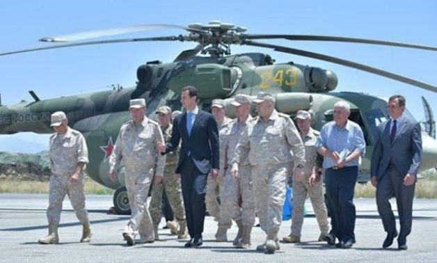 Syria's President Bashar al-Assad visits a Russian air base at Hmeymim, in western Syria in this handout picture posted on SANA on June 27, 2017, Syria -REUTERS
