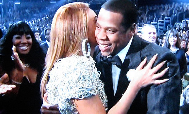 BEYONCE and JayZ hugging each other.