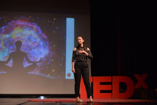 Aia Faham in a TEDx talk